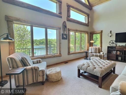 It is even more relaxing when you have these amazing views! The split log trim really brings out the character of this home. And who doesn't like vaulted ceilings?