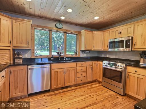 Don't mind doing the dishes when you have a great view of the yard. The Bosch 5 burner gas range, Bosch microwave and Bosh Silence Plus dishwasher are all top of the line.