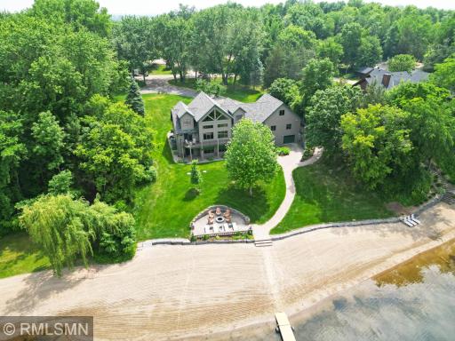 The 1.1 acre lot provides lots of privacy and room for yard games of all kinds. You don't see lakeshore like this very often! 155 feet of firm, sandy shoreline with an expansive sandy beach.