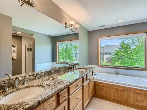 Plenty of storage in this large, double-sink vanity with granite countertops.