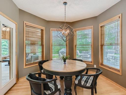 The informal eating space looks out over the backyard.