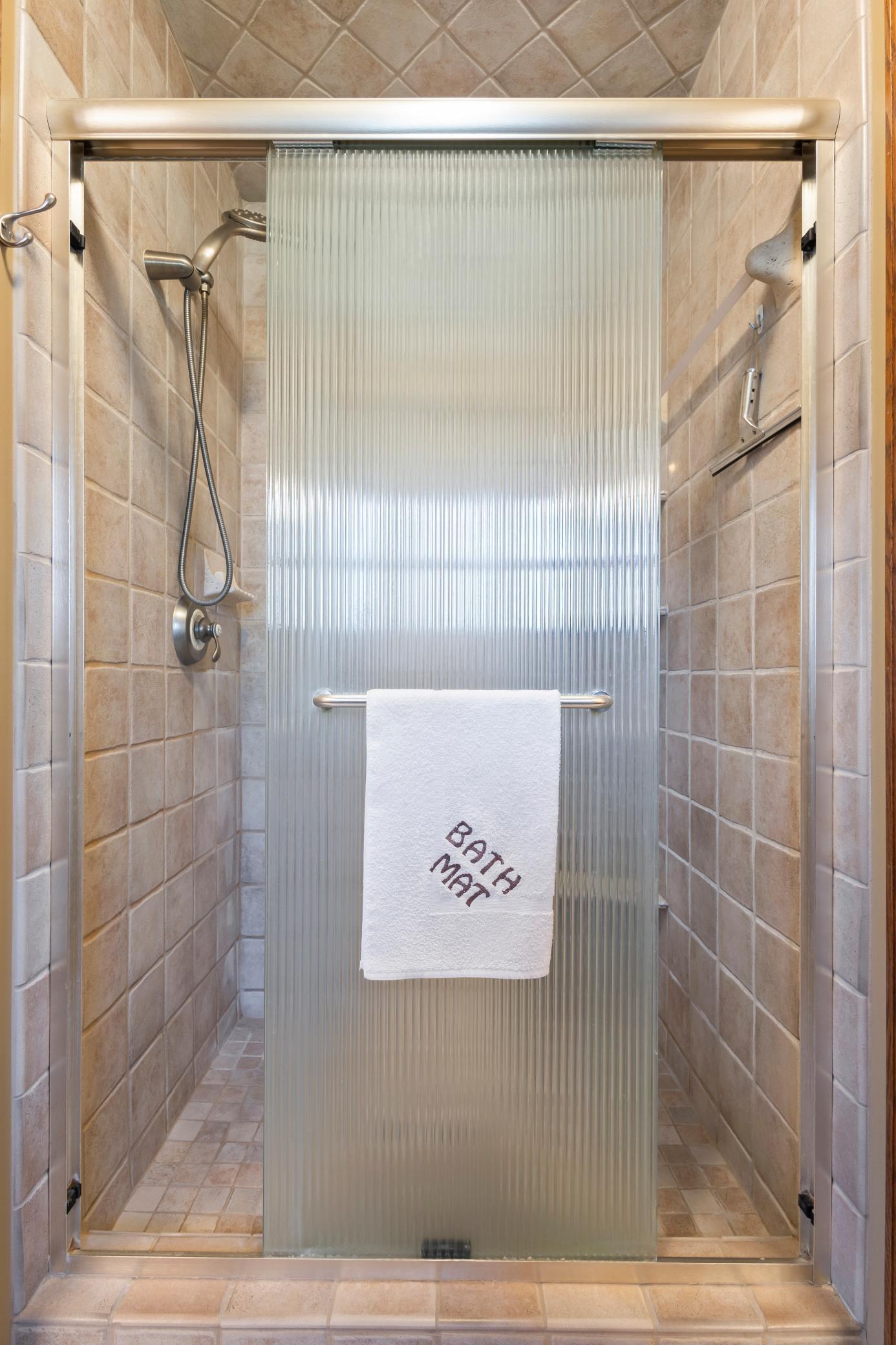 Bedrooms 2 And 3 Tile Shower.jpg