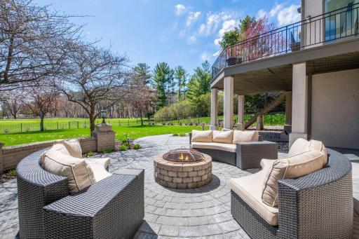 Large patio with firepit and great golf course views