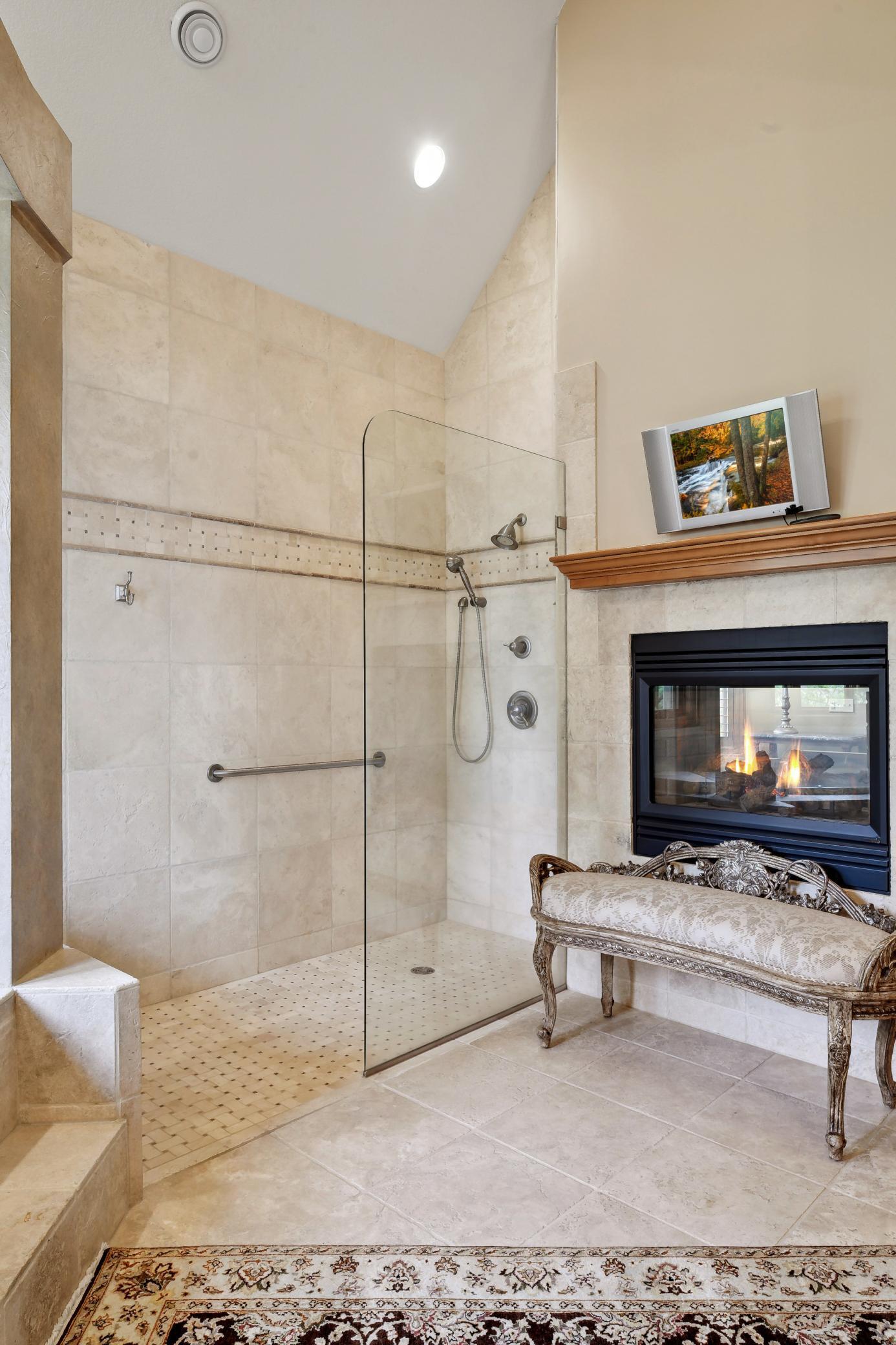 No threshold shower and 2-sided fireplace