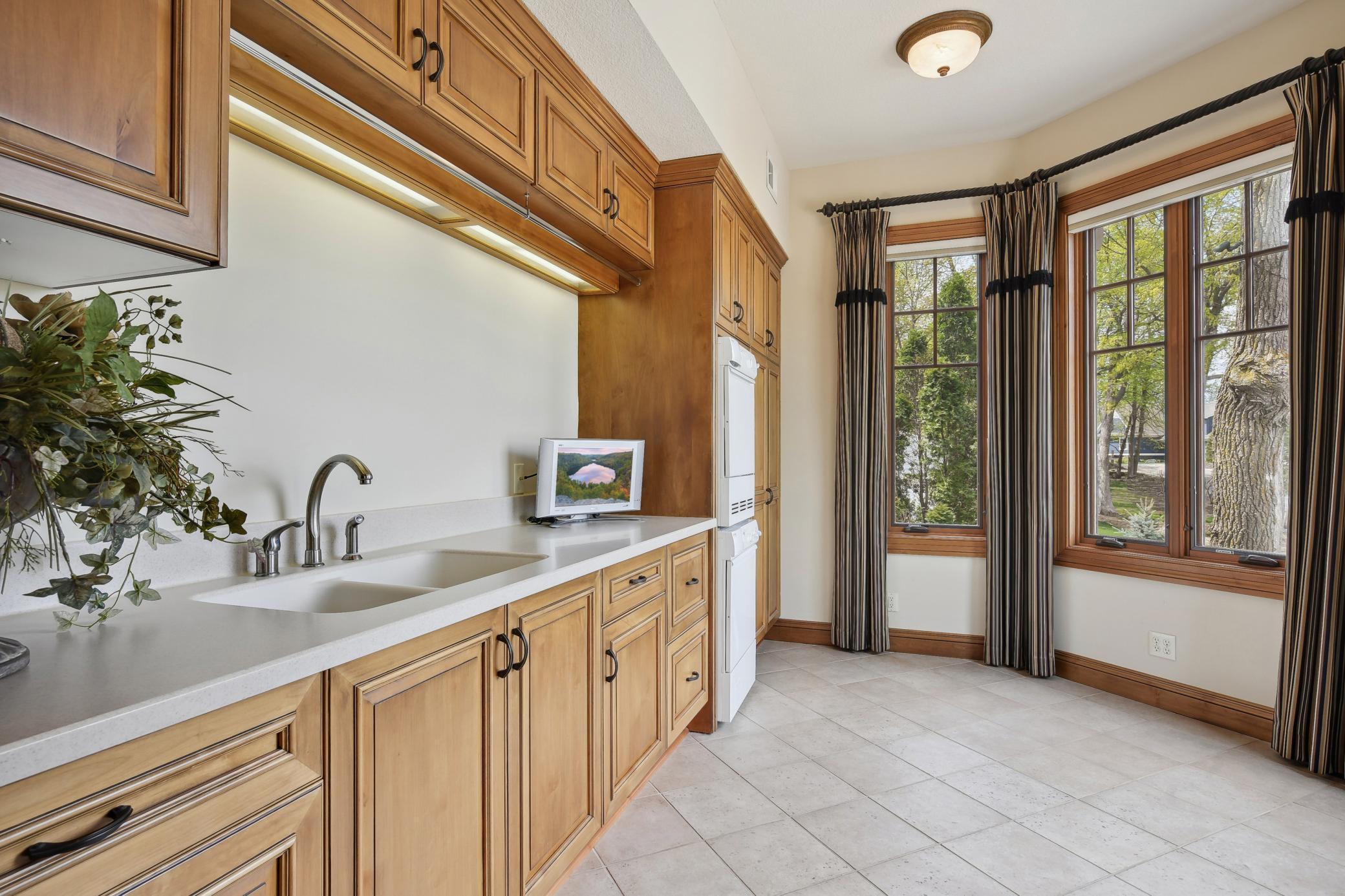 Walk-in pantry/service room, 1 of 3 laundry facilities