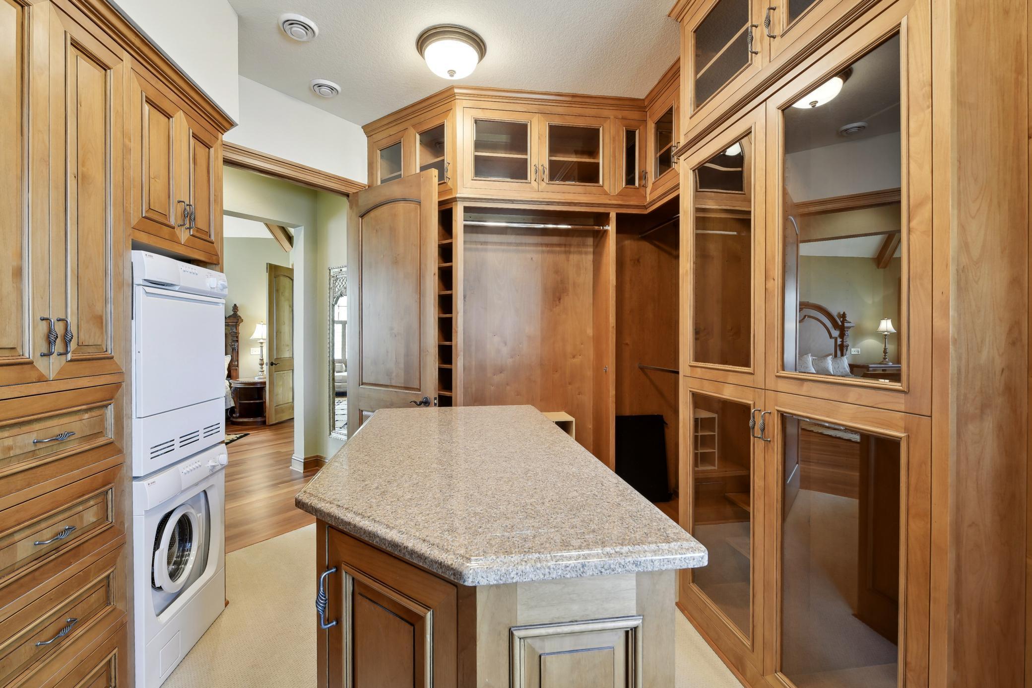 One of three laundry facilities in owner's closet!