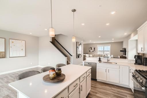 Kitchen- Model home pictured with the same floorplan.