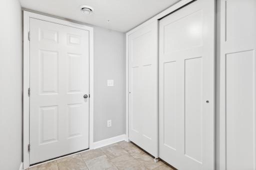 Convenient mudroom entry from the garage. Photos are not of actual home. Actual home will be similar. Some colors and features may vary.