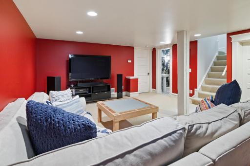 Lower level family room, bath and wine cellar.