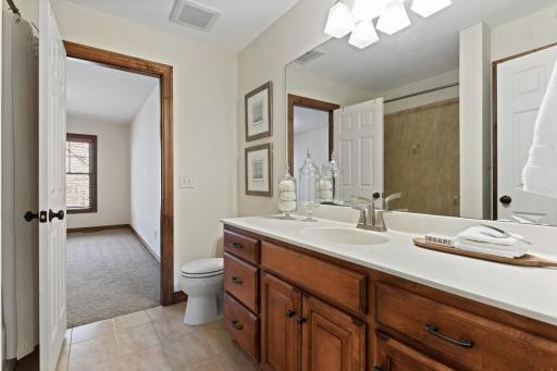 Hallway full bath with access directly into the 4th bedroom on the upper level