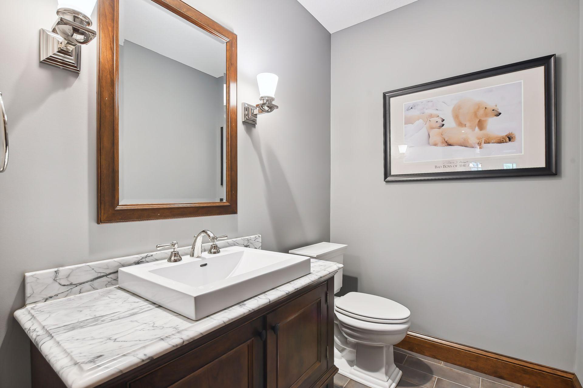 A lower level Powder Room is convenient for guests and visitors.