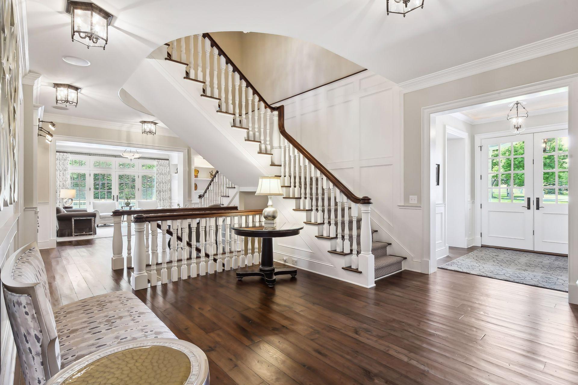 A timeless masterpiece, the home blends old world character and charm with luxurious amenities and the highest-quality finishes. Note the 10-foot ceilings on the main level and large windows that fill every space with natural light.