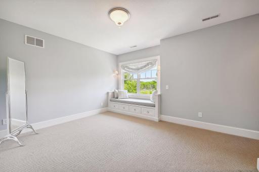 In addition to the Primary Suite, you will find three Junior Suites with walk-in closets on the upper level.