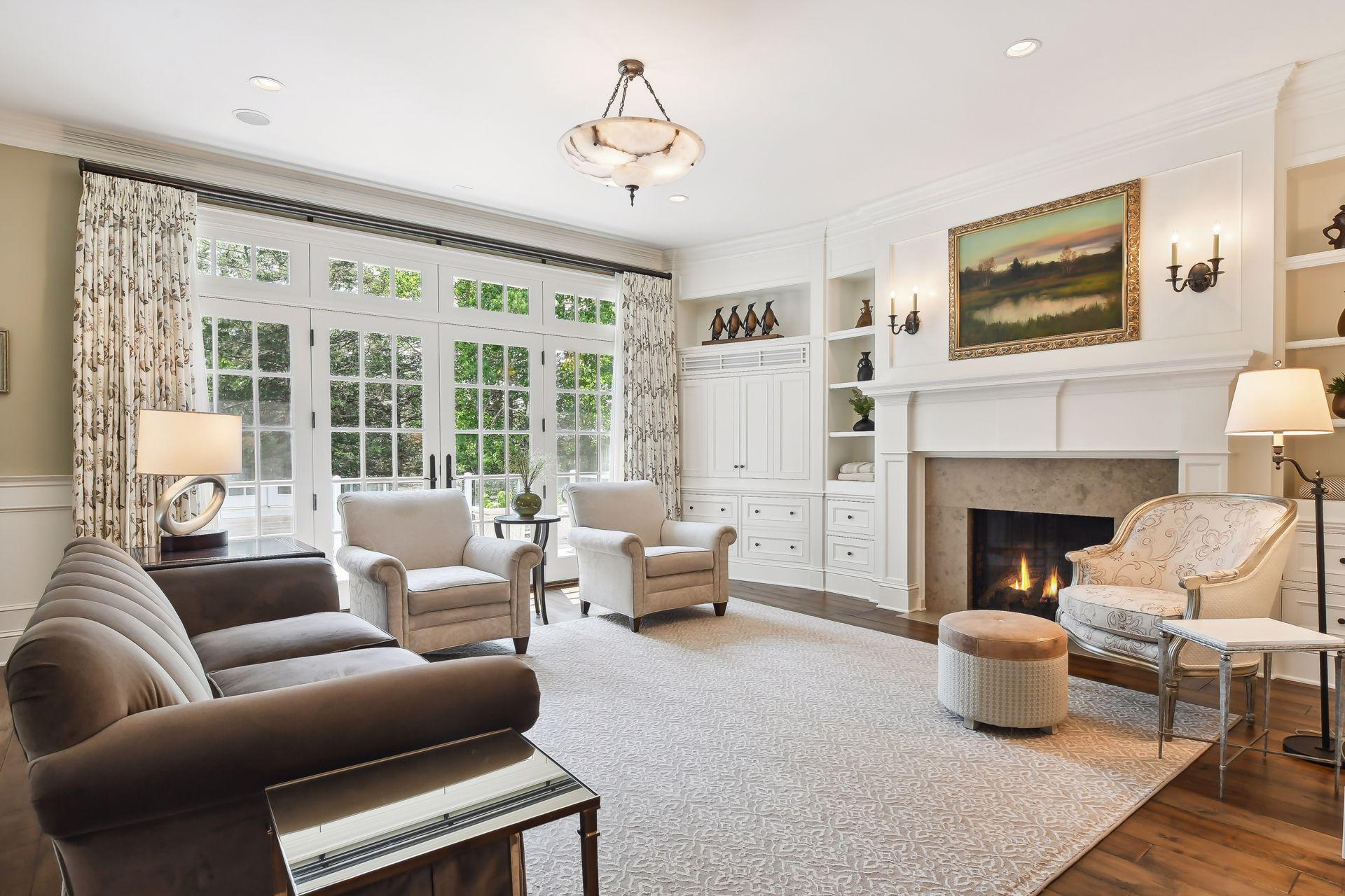 The Family Room enjoys a wall of windows and a French door leading to the Deck and a built-in with storage for your TV and components.