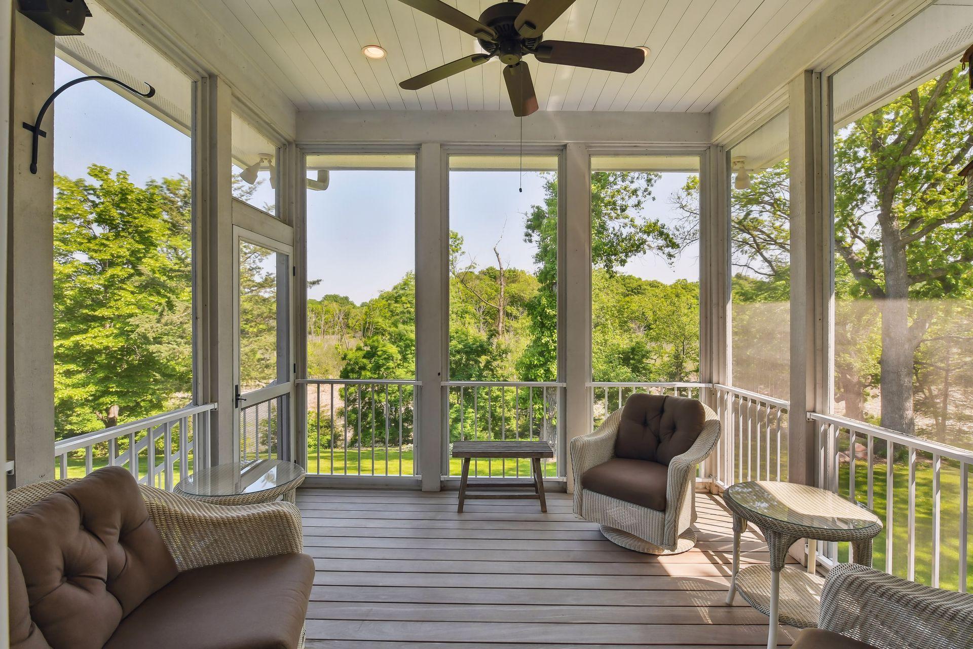 Step out of the Kitchen into the Screen Porch and breath in the fresh air!