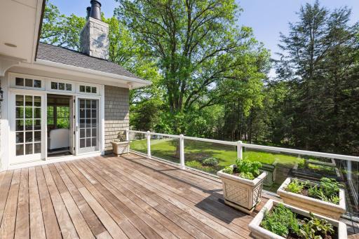 With glass railings, the ipe wood Deck offers uninterrupted views of the surrounding landscape.