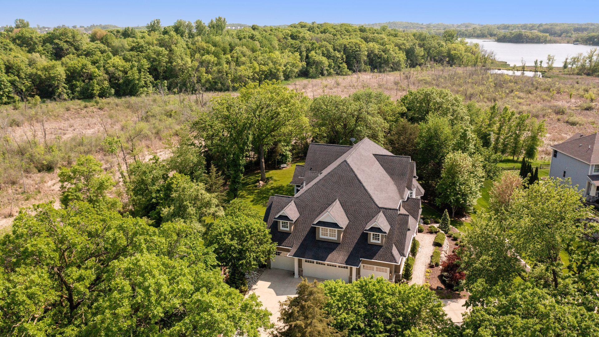 Bounded by natural wetlands and pristine green spaces, this home offers the feel of country-style living with a close in location.