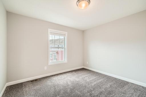 Photo for 7540 38th Street N, Oakdale, MN 55128 - Listing #6368259 2nd Floor 2nd Bedroom- Model home pictured with the same floorplan.