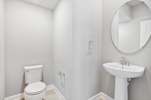Photo for 7540 38th Street N, Oakdale, MN 55128 - Listing #6368259 Powder room conveniently located on the main level. Photos are not of actual home. Actual home will be similar. Some colors and features may vary.