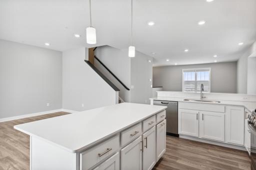 Photo for 7540 38th Street N, Oakdale, MN 55128 - Listing #6368259 Kitchen extends to a 2nd family room or dining area. Photos are not of actual home. Actual home will be similar. Some colors and features may vary.