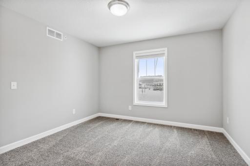 Photo for 7540 38th Street N, Oakdale, MN 55128 - Listing #6368259 Upstairs 1st bedroom. Photos are not of actual home. Actual home will be similar. Some colors and features may vary.