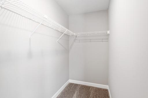 Photo for 7540 38th Street N, Oakdale, MN 55128 - Listing #6368259 Second walk-in closet in the owner's suite. Photos are not of actual home. Actual home will be similar. Some colors and features may vary.
