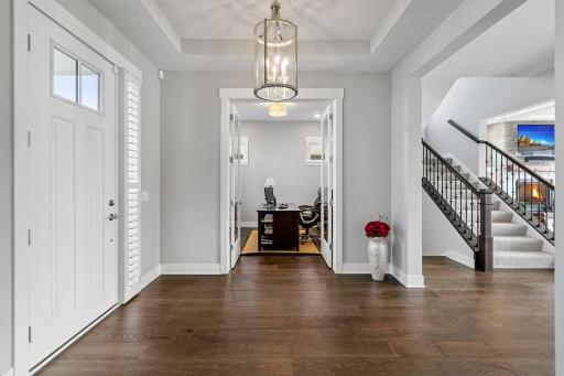 Gorgeous entrance that branches off to main level office, formal dining, open concept kitchen and family living space!
