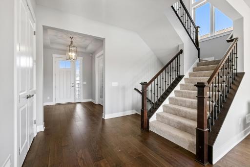 Grand entry with gleaming hardwood floors