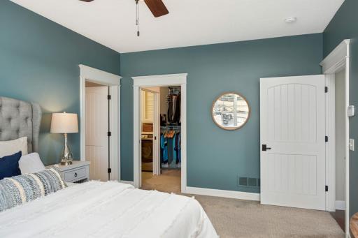 The door on the left opens to the primary full BA, door straight ahead leads to spacious walk-in closet, and the main floor laundry room is accessible through another door in the closet. You will find high-end plush carpet in office, BR & closet.