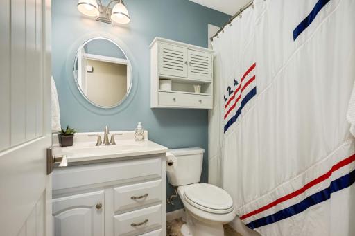 Full bathroom shared with the 3 bedrooms above the garage.