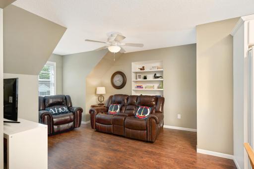 Walk up a few stairs from the back entry to this in-law suite complete with family room/loft, kitchenette, full bathroom and 3 bedrooms, all located above the garage.