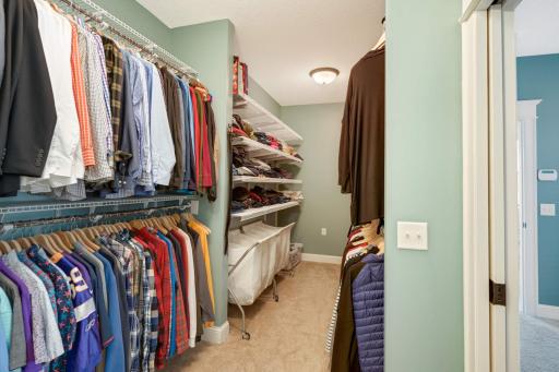 Two pocket doors to this closet. The first opens to the primary main floor bedroom, and the second to the main floor laundry room.