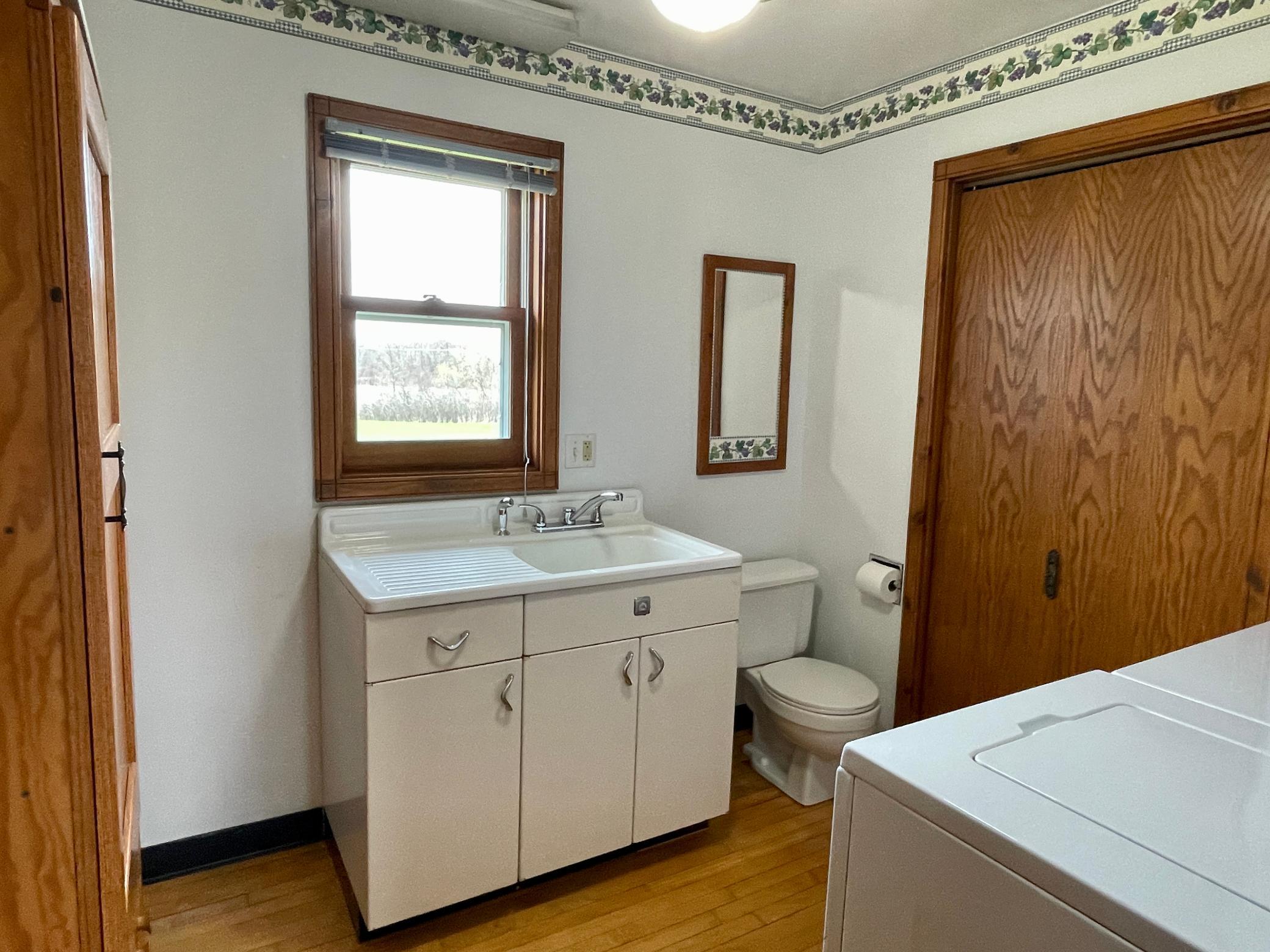 11-Laundry room with half bath (2).jpg