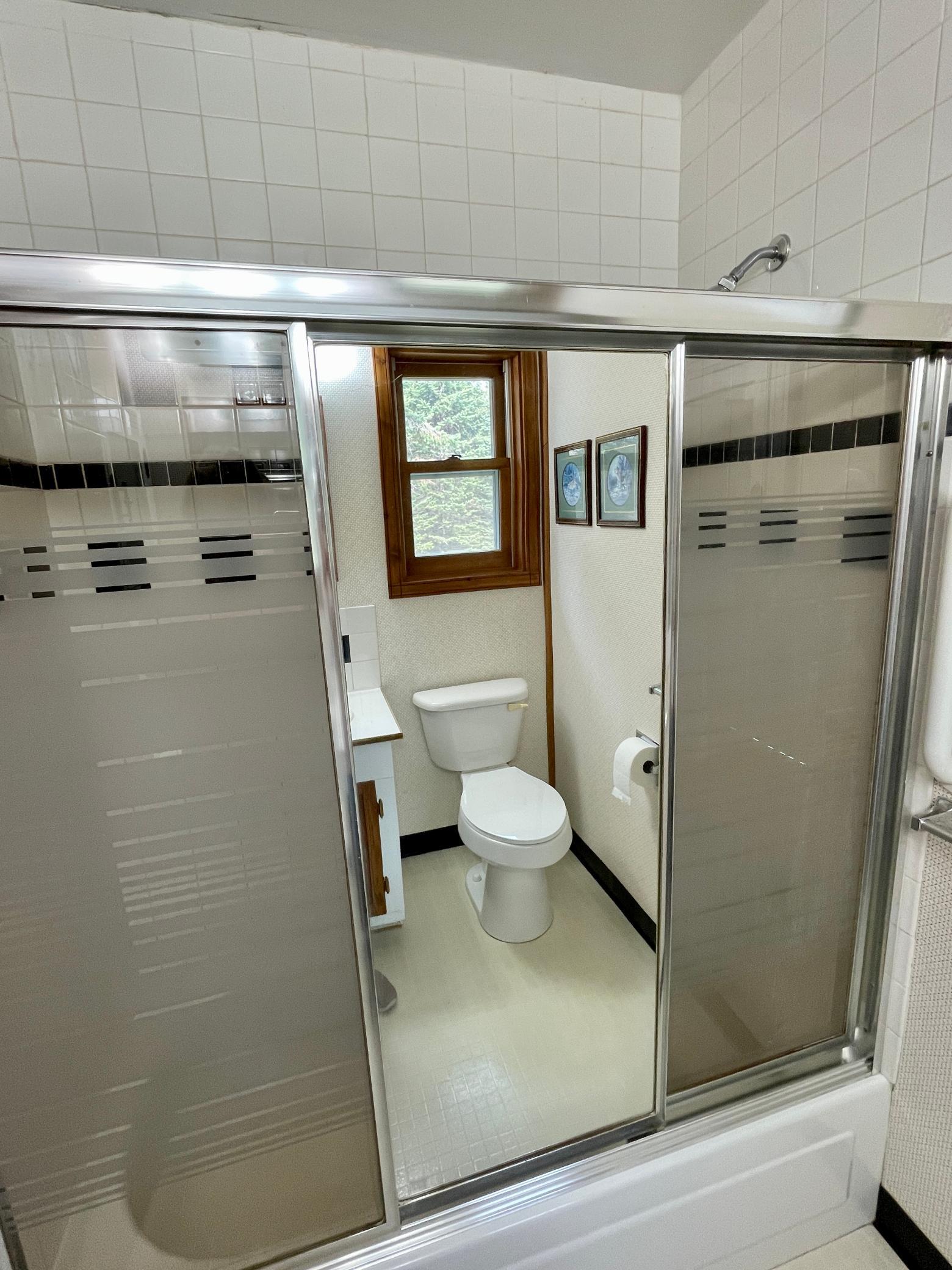 7-Bedroom 2 with attached full bath (4).jpg
