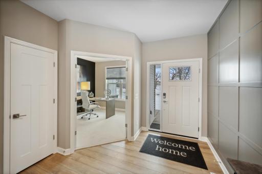 Photo for 6613 Coach House Lane, Corcoran, MN 55340 - Listing #6369342 Light and bright entry! Enjoy a quiet space to work in the office with glass French doors. Photo is of model home. Color and finish can vary.