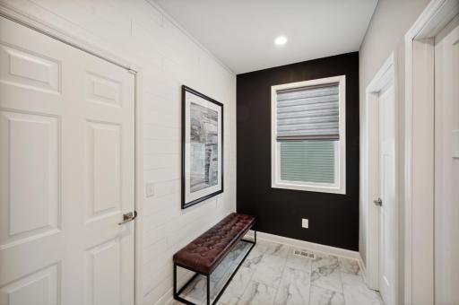 Photo for 6613 Coach House Lane, Corcoran, MN 55340 - Listing #6369342 Mud room provides ample storage featuring a walk-in closet to keep area uncluttered. Photo is of model home. Color and finish can vary.