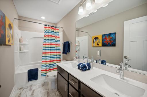 Photo for 6613 Coach House Lane, Corcoran, MN 55340 - Listing #6369342 Upper level hall bathroom. Photo is of model home. Color and finish can vary.