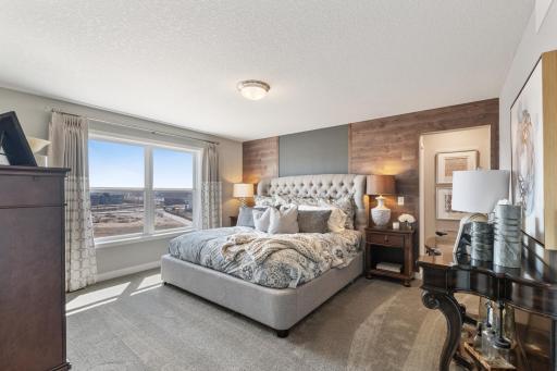 Photo for 6613 Coach House Lane, Corcoran, MN 55340 - Listing #6369342 A true oasis, the owner's suite can accommodate many furniture arrangements including a king size bed. Photo is of model home. Color and finish can vary.