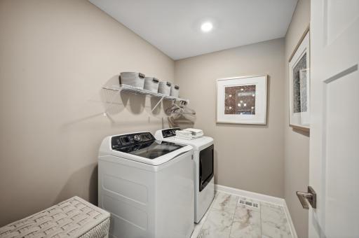 Photo for 6613 Coach House Lane, Corcoran, MN 55340 - Listing #6369342 Convenient upper level laundry will feature the laundry tub option. Model home shown. Color and finish can vary.