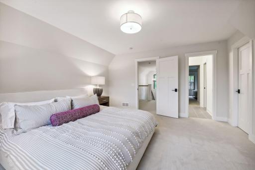Upper level 3rd bedroom- with walk thru bathroom.