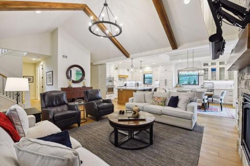 Open main floor plan (living, kitchen, dining).