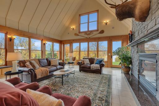 Main floor living room w/vaulted ceilings