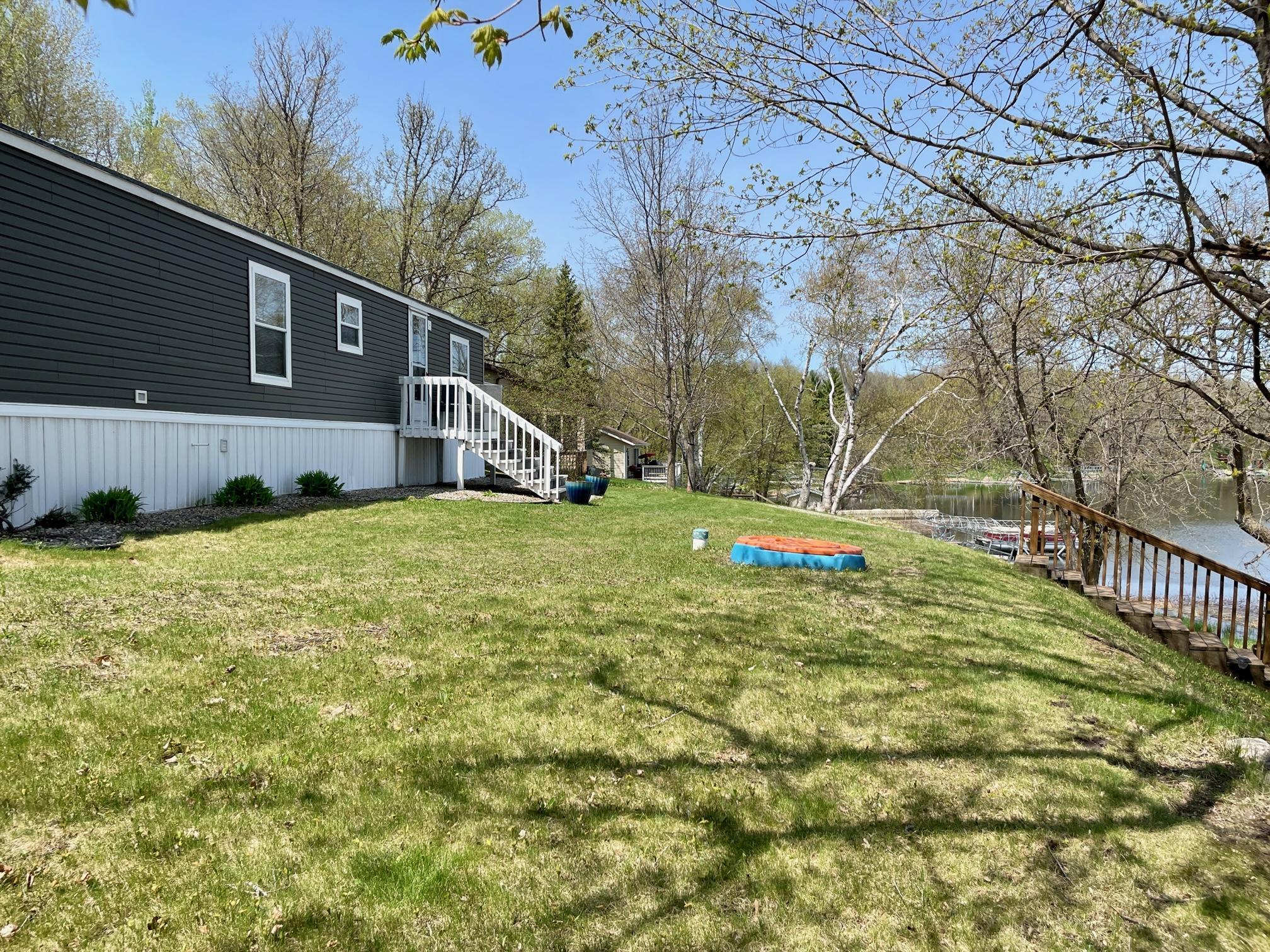 4-Lakeside yard with plenty of room to play and relax (3).jpg