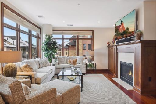 Cozy gas fireplace anchors the living area