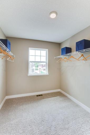 Primary suite large walk in closet.