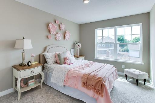 Space is also abundant in each of the home's three additional upper level bedrooms! (Photo of same plan, colors will vary)