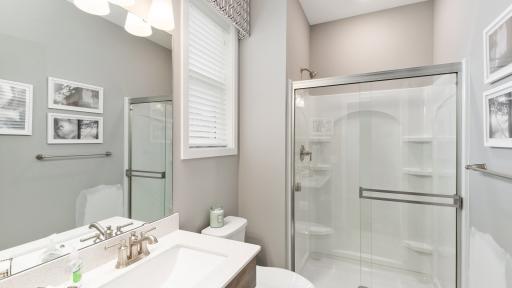 Main level 3/4 bath *Please note, photos are not of actual home, but of a model. Colors and features will vary in actual home.