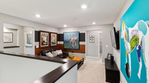 The upper level also features this loft space! *Please note, photos are not of actual home, but of a model. Colors and features will vary in actual home.