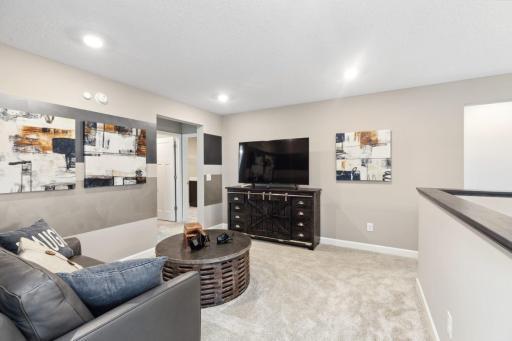 Upper level loft area. *Please note, photos are not of actual home, but of a similar model. Colors and features will vary in actual home.