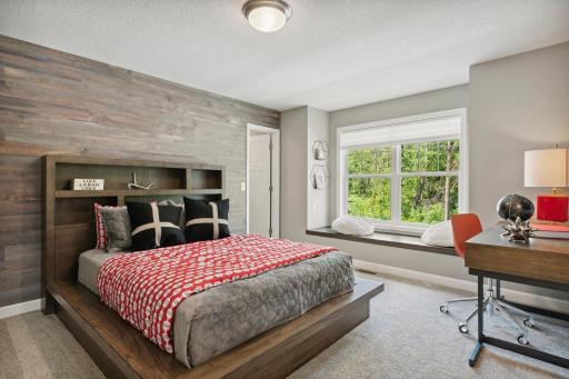 Bedroom 4 with window seat. *Please note, photos are not of actual home, but of a similar model. Colors and features will vary in actual home.